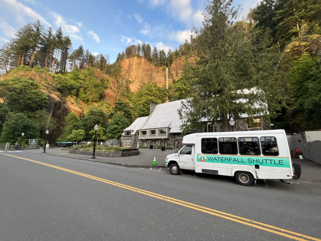 Waterfall shuttle parked in front of Multnomah Falls Lodge